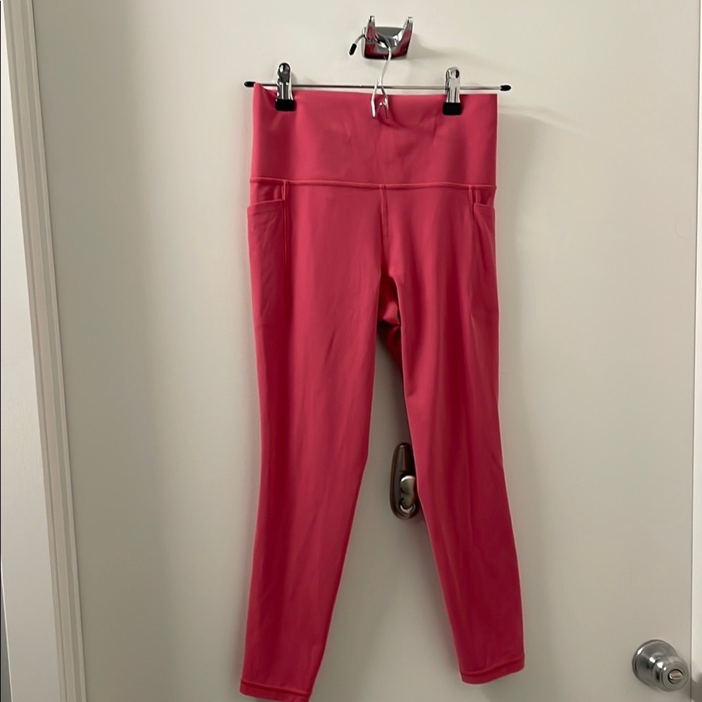 Athleta Salutation Stash Pink 7/8 tight. Never worn!! Perfect condition!